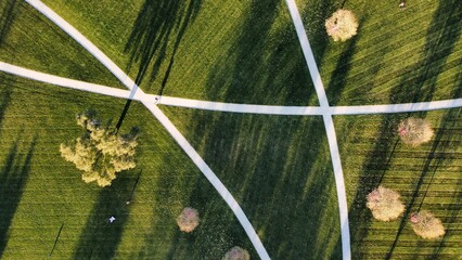 Sidewalks cutting through the grass
