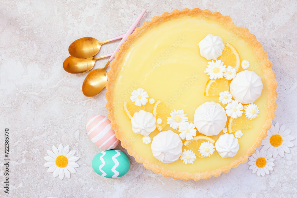 Aufkleber spring lemon tart with white chocolate flowers and meringue. easter dessert concept. above view tabl