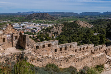 Xativa Castle or Castillo de Xativa - ancient fortification on the ancient roadway Via Augusta in Spain. Medieval ruins of the walls of Xativa castle. Xativa, Spain, Europe.