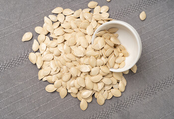 Whole Pumpkin Seeds in Shell Isolated, Raw Pepita Grains, Scattered Green Healthy Nuts