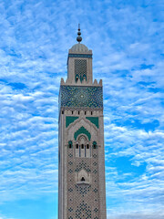 Fototapeta premium Casablanca, Morocco - December 28, 2023: Architectural details of the exterior of the Hasaan II Mosque in Casablanca, Morocco 