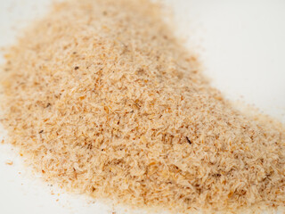 Dietary supplement in the form of fiber on a white background. Fiber close up.