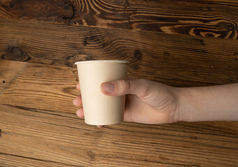 Hand Holds Cup, Empty Paper Cup in Hands, Coffee Mug, Teacup, Hot Beverage Mockup, Cup in Arms