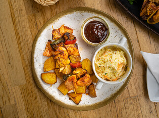 Poultry Shish Kebab, Barbecue Shashlik with Meat and Vegetables, Fruits, Peppers, Onions and Pineapple