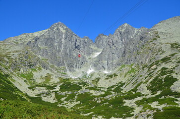red cable car in the tatry mountains