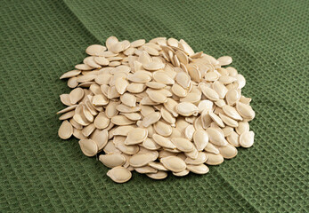 Whole Pumpkin Seeds in Shell Isolated, Raw Pepita Grains, Scattered Green Healthy Nuts