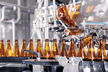 Process pasteurization of bottles on conveyor machinery of brewery. Germ removal and glass cleaning...