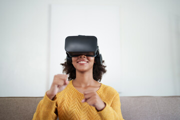 Young woman using VR headset in glasses of virtual reality technology VR experience Future technology concept.