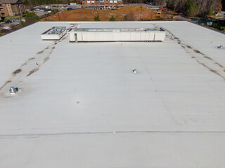 Fototapeta premium Drone Photos of TPO Roofing on Commercial Building