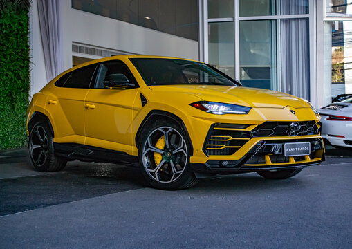 Yellow Lamborghini Urus front view three quarters - High Resolution Image
