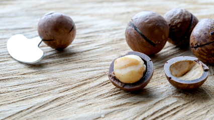 macadamia nuts on a wooden background