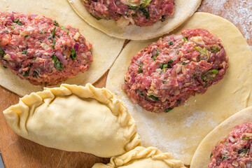 Close-Up of Preparing Homemade Beef Stuffed Empanada - Captivating 4K Ultra HD Image of Culinary Creation