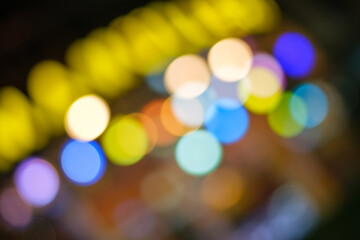 Defocused bokeh lights in blur night background. Night time shot with space for text.