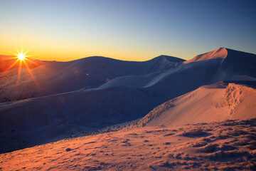 Fantastic evening winter landscape. Colorful overcast sky. Europe. Beauty world.