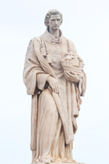 Lisbon, Portugal - December 11, 2023: Statue of St. Vincente (Sao Vicente) at Santa Luzia viewpoint in Alfama district.