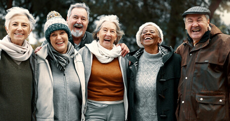 Happy, portrait and senior friends in a park while walking outdoor for fresh air together. Diversity, smile and group of elderly people in retirement taking picture and bonding in a forest in winter.