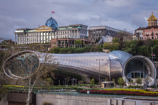 Tbilisi, Georgia - April 24, 2015: Former Concert Hall in Rke Park and firmer Palace of Presidential Administration in Tbilisi city