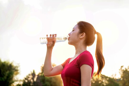 Sporty Woman Drinking Water Sunlight 1