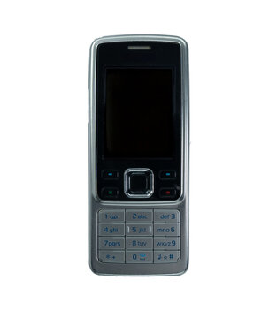 Close-up of an old and obsolete cell phone on a white background. Isolated.10