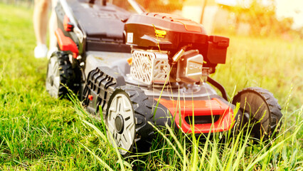 lawn mower on the lawn on a summer day