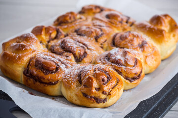 cooked baked sweet bun rolls with chocolate filling