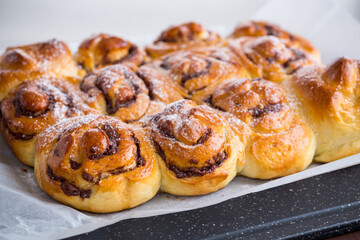 cooked baked sweet bun rolls with chocolate filling