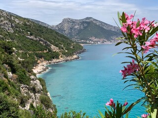 Sardinia beach blue and turquoise with mountain