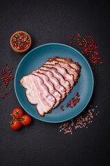 Delicious fresh pancetta or bacon with salt and spices cut into thin slices