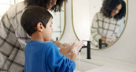 Happy woman, child and hands and washing in bathroom, cleaning to prevent germs and dirt in home...