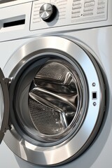 A close up view of a washing machine with the door open. This image can be used to showcase household appliances or demonstrate the process of doing laundry