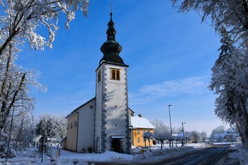 Church in the village of Breg at Sorško Polje in Gorenjska, Slovenia in winter