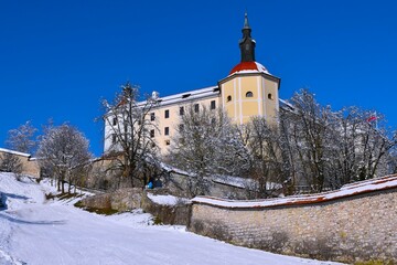 View of Škofja loka castle in Gorenjska, Slovenia in winter