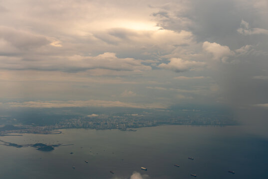 Aerial View of downtown PAnama City and transports boats with dense clouds in the sky