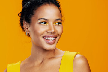 Portrait woman creative beauty yellow cosmetic colourful black beautiful face make-up african smile