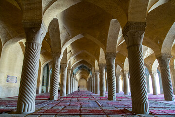 Shadows and lights of the interior of a mosque named Vakil in Shiraz, Iran with impeccable details.