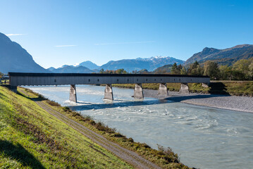 Fototapeta na wymiar The historic old Rhine bridge between Liechtenstein and Switzerland
