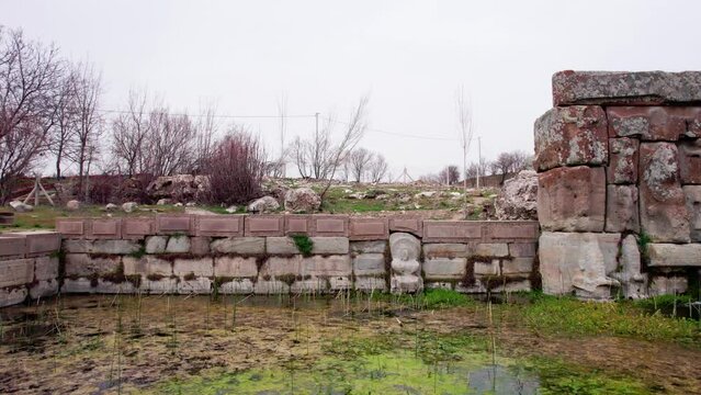 Eflatun Pinar ( Eflatunpinar) Ancient Hittite relief sculpture monument and sacred pool, and its Hittite relief scultures of Hittite gods, Beysehir Konya Turkey
