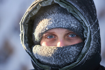 Person With Hood Covered in Snow