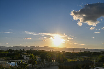 the sun sets behind the mountains in Cyprus 6