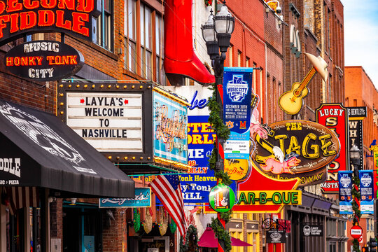 Famous Neon signs of blues clubs on Beale street at day in downtown Nashville