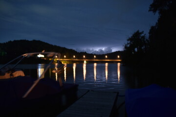 mysterious night time lake aesthetic creepy lightning summer night vibe