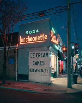 Hildebrandts vintage neon sign at night, Williston Park, New York