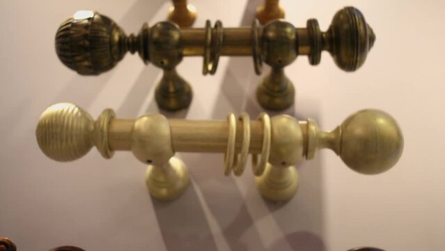 Several different cornices are on showcase in decoration shop