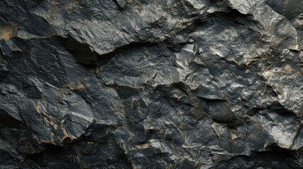 Black or dark gray rough grainy stone or sand texture background