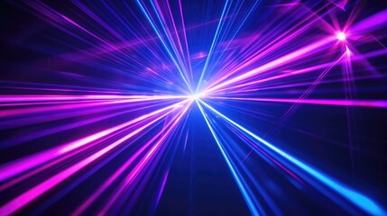 Obraz premium Blue and violet beams of bright laser light shining on black background