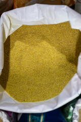 wheat porridge or cracked maize for sale at retail shop from top angle at day