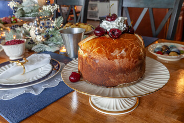 Panettone bread with cherries and whipped cream