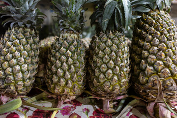 fresh pineapple at fruit store for sale at evening