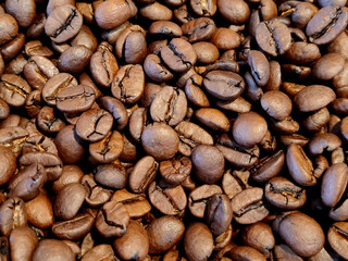 roasted coffee beans background. full frame coffee beans close up