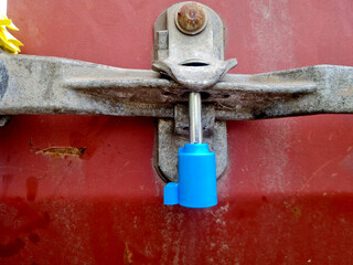 Container door security seal, seal with seal code number to secure goods in shipping.